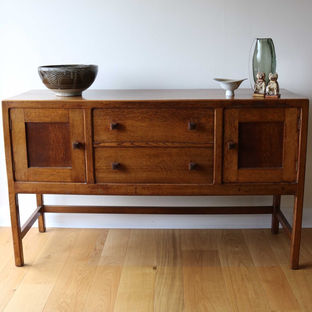 Heals oak Cotswold style sideboard, 1920s